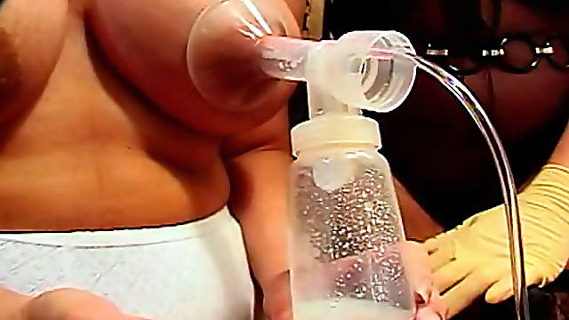 Mistress pumps slave tits for milk