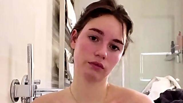 Busty curly brunette with big boobs fucks on couch