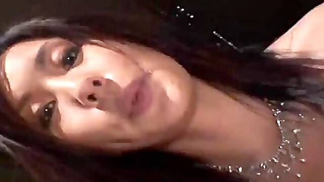 Lewd Mecumi squeezes a cock between her big boobs