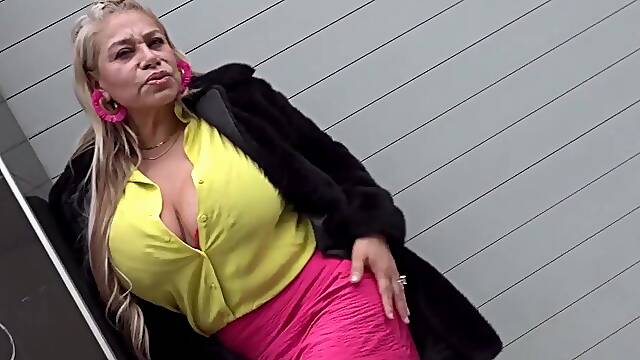 GILF with massive boobs having fun with a big one