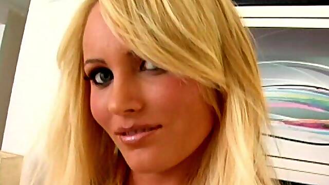 Indulge in the seductive charms of busty blonde Hannah Hilton as she tantalizes and pleasures...