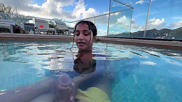Busty wife gives naughty hotel pool blowjob