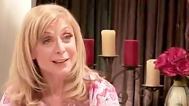 A housewife lesbian Nina Hartley shows a younger one what to do