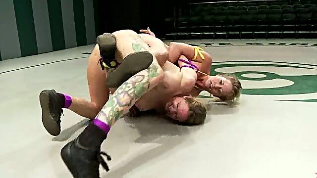 Busty blondes Holly Heart and Rain DeGrey have a catfight on tatami