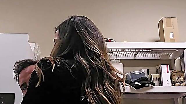 Charming angel in a costume sneaking a screw in at work in back office