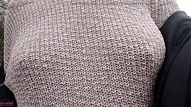 Boobwalk: Walking braless in a pink watch throughout knitted sweater