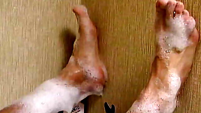 A sexy dark haired German babe gets her hairy twat pounded in the bathroom