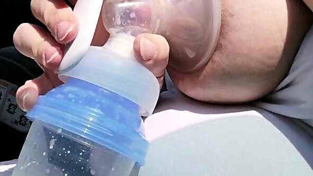 Pumping my big milk tits empty in the car