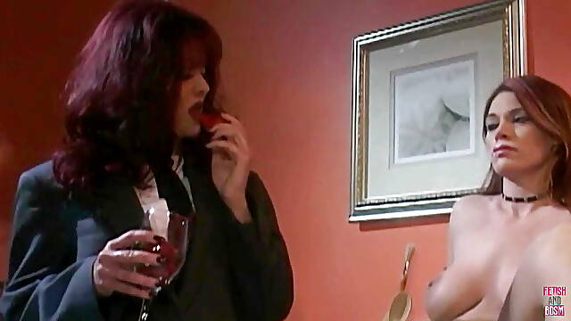 A Redheaded Lesbian Babe Is Making Other Big Breasted Lady Eat Cakes and Fruit