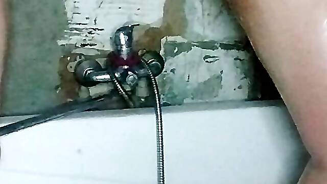 Camera in the bathroom, and a girl with a big ass is peeing, very sexy