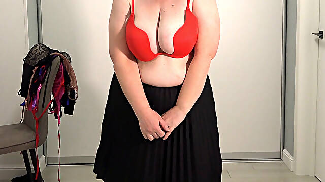 Mature wife chooses a bra for work. Big gorgeous boobs bounce and pop out of bras. Saggy tits.