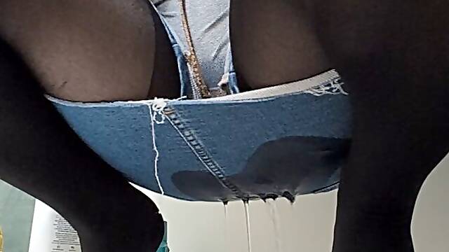 Wetting Denim Skirt & Black Stockings While Crouched