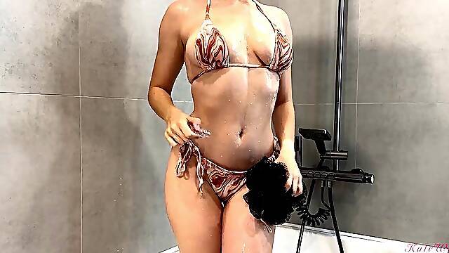 Girlnextdoor with ample titties displayed off her sexy bikin. Sex in the bathroom