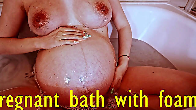 Bath with Foam for Pregnant Blonde with Big Boobs